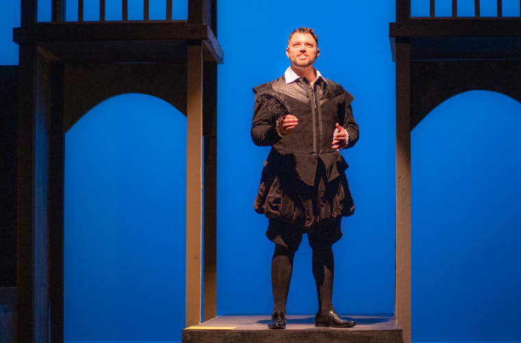 An actor performing Shakespeare on stage at the University of Louisiana at Lafayette.